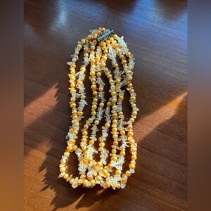 Gold tone multi strand necklace